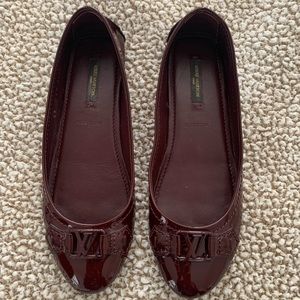 Louis Vuitton Women’s Drivers size 37 in burgundy patent leather.